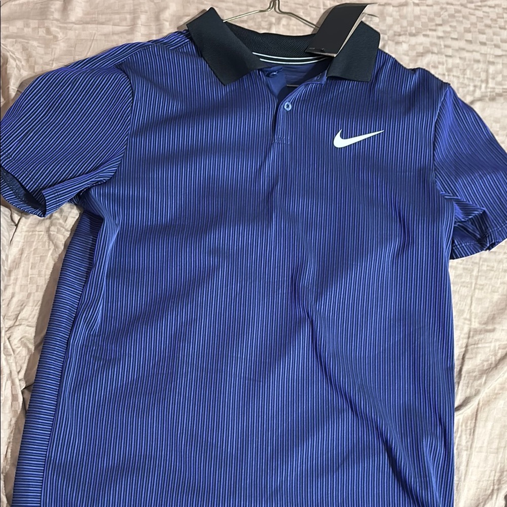 Nike Blue Polo Shirt with Black Collar and Textured Fabric